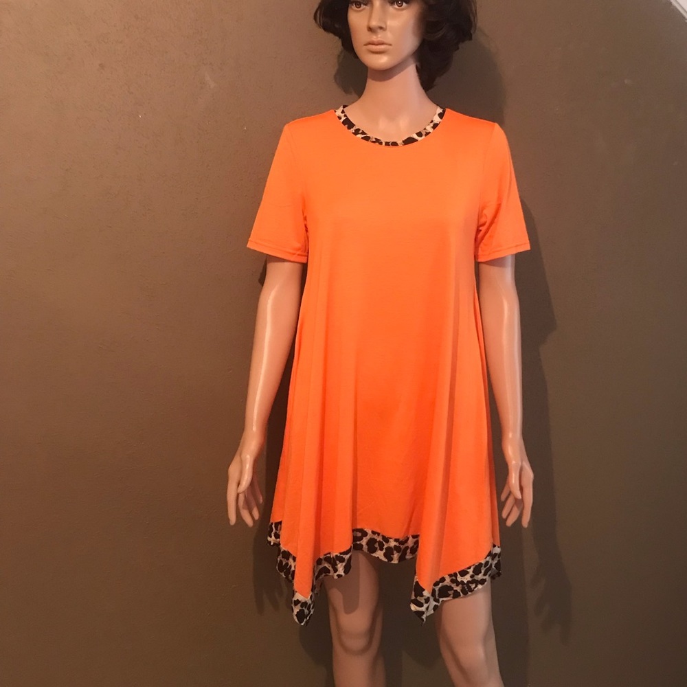 Orange dress with cheetah print edging